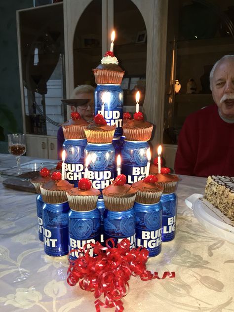 Beer tower cake 49ers Birthday Party Ideas For Men, Beer Can Cake Tower, Beer Bottle Cake Tower, Lollipops Bouquet, Beer Tower Cake, Alcohol Tower, Beer Cake Tower, 49ers Birthday Party, Birthday Gifts For Guys