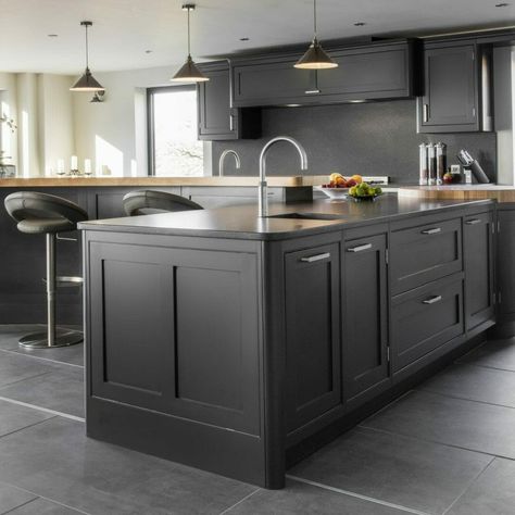 This bespoke hand-painted Shaker kitchen is a blend of dramatic and classic elements✨

Featuring high-contrast cabinetry and a striking Silestone ‘Arden Blue’ worktop, this design couples modern sophistication with timeless charm. The large island not only offers ample prep and seating areas, but also showcases a beautiful butcher’s block and sweeping curves.

#ashleyjaykitchens #kitcheninspo #luxurykitchens #kitchendesign #bespokekitchens #kitchendecor #shakerkitchen #bespokehomedesign Black Shaker Kitchen, Curved Seating, Art Deco Kitchen, American Fridge, Range Cooker, Shaker Kitchen, Classic Kitchens, Bespoke Kitchens, Luxury Kitchens