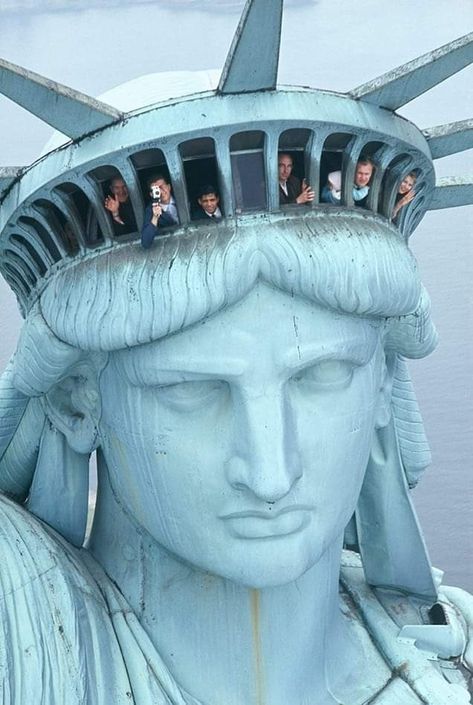 Tourists look out the windows on the Statue of Liberty's crown. No date given, but it looks like it could be early 1960s? The Cranes Are Flying, Statue Of Liberty Crown, Liberty Island, Nyc Summer, New York Harbor, The Statue Of Liberty, Historic Photos, Lady Liberty, Historical Photos