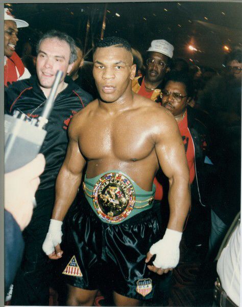 A young Iron Mike Tyson. Mike Tyson Shirt, Frank Bruno, Mighty Mike, Mike Tyson Boxing, Muhammad Ali Boxing, Boxing Images, Iron Mike, Ufc Boxing, Muhammed Ali