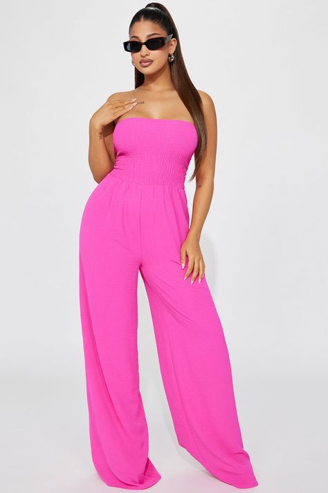 Available In Royal And Hot Pink. Jumpsuit Tube Strapless Smocked Wide Leg Slight Stretch 100% Polyester Imported | Mabel Smocked Jumpsuit in Hot Pink size Small by Fashion Nova Hot Pink Jumpsuit Outfit, Pink Jumpsuit Outfit, Pink Jumpsuits Outfit, Hot Pink Jumpsuit, Pink Top Outfit, Smocked Jumpsuit, Hot Pink Jumpsuits, Hot Pink Fashion, Pink Jumpsuit