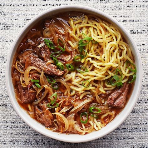 This super-savory dish draws its inspiration from Taiwanese beef noodle soup, then gilds the lily with a Dutch oven’s worth of sweet, slow-simmered onions—the best part of French onion soup. French Onion Beef, Leftovers Soup, Beef Noodle Soup, Noodle Soup Recipes, Beef And Noodles, Salad Sandwich, French Onion Soup, January 15, Noodle Dishes