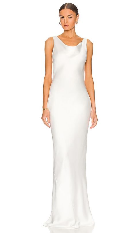 Find NORMA KAMALI Maria Gown In White on Editorialist. Norma Kamali Maria Gown in White. - size M (also in S) Norma Kamali Maria Gown in White. - size M (also in S) 100% polyester. Made in China. Machine wash. Fully lined. Pull-on styling. Draped neckline. Midweight satin fabric. style runs large, size down. NKAM-WD370. ST2223CB739944. The first designer to receive a plaque on New York's 7th Avenue, she is credited with inventing the sleeping bag coat, the silk parachute look, high heeled sneake Heeled Sneakers, Sleeping Bag Coat, Norma Kamali Dress, High Heel Sneakers, Draped Neckline, Bridal Shower Dress, Sleeveless Gown, Shower Dresses, Modern Bridal