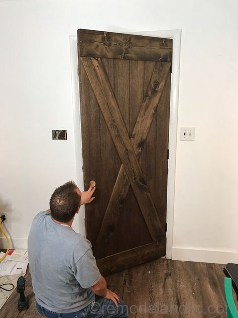 DIY Wood Barn Door on Hinges for $25 #remodelaholic Bifold Pantry, Hinges Diy, Barnwood Doors, Rustic Entryway Table, Making Barn Doors, Barn Door Hinges, Old Barn Doors, Wood Barn Door, Rustic Entryway