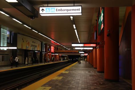 A metro station, in Montreal, with red columns and the tracks in the middle left Montreal Metro, Metro Subway, Montreal, Architecture, Band