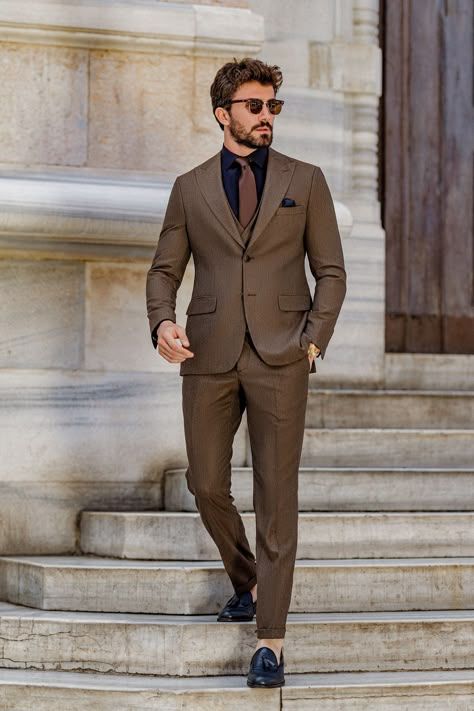 Step into timeless elegance with the Brown Slim-Fit Suit 3-Piece. Its sleek fit and rich brown tone bring out an understated charisma that complements both professional and formal events with ease.

#brownslimfitsuit #elegantmenswear #classylook #formalfashion #modernfit #tailoredsuit #professionalstyle #sharpdressing #businessattire #menssuit 3 Button Suit Men, Brown Suit Black Shirt, Brown Suit Outfit Men, Brown Blazer Outfit Men, Brown Blazer Men, Brown Suit Wedding, Brown Suits For Men, Mens Formalwear, Modern Fit Suit