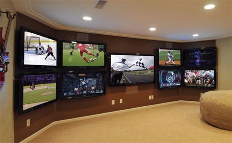 Here's a tv setup for watching sports Man Cave Tv Wall, Tv Setup, Basement Kitchenette, Tampa Homes, Ultimate Man Cave, Man Cave Room, Man Cave Basement, Man Cave Wall, Man Cave Home Bar