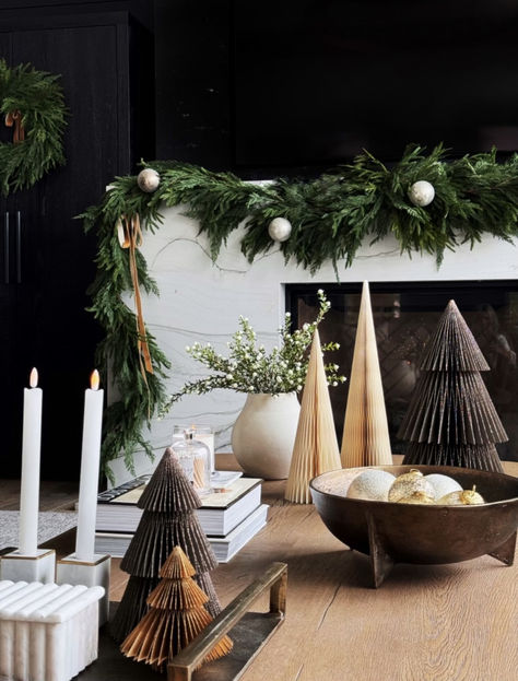 Create a sophisticated and inviting holiday tablescape with modern, minimalist decor. From textured paper trees to warm candlelight, this simple yet refined styling is perfect for elevating your festive gatherings with a touch of understated charm. Christmas Coffee Table Styling, Modern Christmas Coffee Table Decor, Christmas Balcony Decor, Small Evergreens, Christmas Dining Table Decorations, Christmas Balcony, Dining Table Decorations, Modern Minimalist Decor, Modern Tablescape