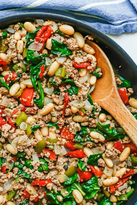 Italian ground turkey skillet with white beans, diced tomatoes and spinach is an easy, flavorful all-in-one pan dinner that’s ready in just 25 minutes! Italian Turkey Skillet, Ground Turkey And Sausage Recipes, Italian Ground Turkey Recipes, Italian Ground Turkey, Ground Turkey Skillet, Turkey Skillet, Ground Turkey Recipes Easy, Ground Turkey Recipes Healthy, Simple Dinners