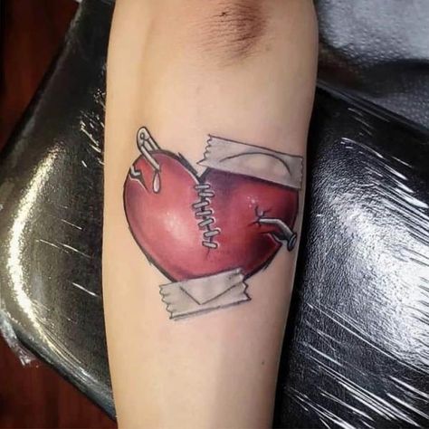 For some, these stories are best told through ink on skin—a broken heart tattoo. But let’s not dwell in the past. Let's dive into the diverse ways a Koch Tattoo, Safety Pin Tattoo, Heart Tattoo Ideas, Heart With Wings Tattoo, Web Tattoo, Heart Tattoos, Tattoo Now, Forearm Tattoo Women, Heart Tattoo Designs