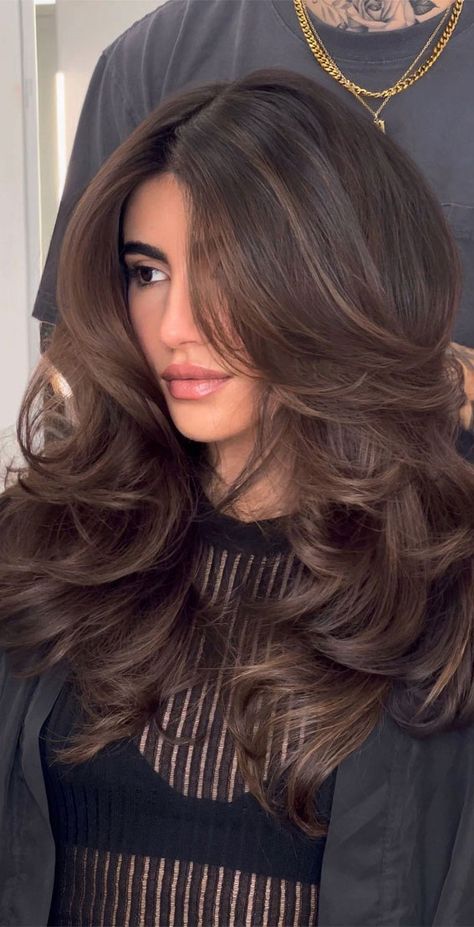 52. Rich Brunette + Mega Volume In the 1970s and 1980s, the term “butterfly haircut” was used to describe a hairstyle popularized by Farrah... Butterfly Hairstyle, Haircut Selfie, Photo Hijab, Haircuts For Long Hair With Layers, Brown Hair Inspo, Fesyen Rambut, Vlasové Trendy, Cute Hairstyle, Hairstyles For Layered Hair