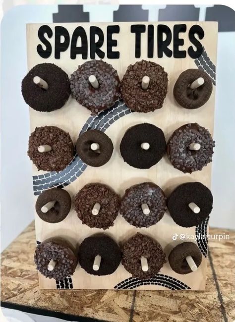 Spare Tire Donut Sign, Donut Spare Tire, Car Donuts Spare Tires, Tire Party Decorations, Tire Donut Diy, Cars And Trucks Birthday Party Decorations, Mindy Weiss Birthday Party, Spare Tires Birthday, Spare Tire Donut Wall