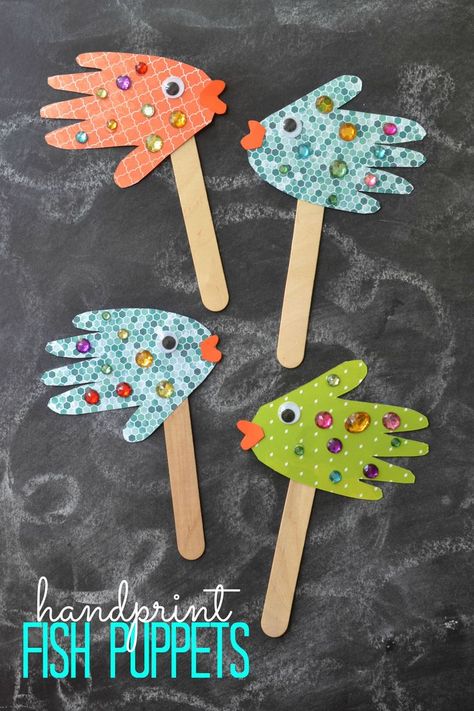 Easy Kids Craft: Handprint Fish Puppets | Happy Crafting | Blitsy Fish Puppets, Handprint Fish, Kraftangan Prasekolah, Kerajinan Diy, Aktiviti Kanak-kanak, Seni Dan Kraf, Fish Crafts, Vbs Crafts, Ocean Crafts