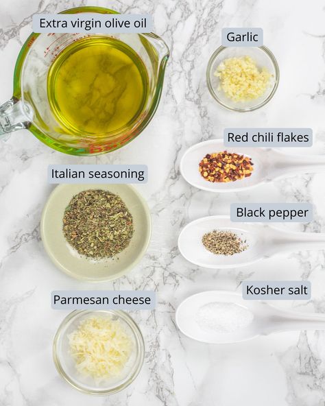 This restaurant-style bread dipping oil is an easy-to-make appetizer that everyone will love. You’ll need a few pantry staples and 5 minutes to make this Italian olive oil dip. Easy Bread Dip, Diy Infused Olive Oil Recipes, Italian Olive Oil Dip For Bread, Olive Oil Dip For Bread Easy, Olive Oil Bread Dip Recipe, Italian Bread Dipping Oil Recipes, Bread And Oil Dip Recipes, Bread Oil Dip Recipes, Oil For Bread Dipping