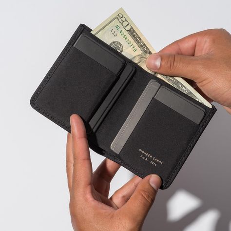 The modern all-rounder billfold wallet with a clean vertical layout. Holds all currencies for seamless international travel while maintaining a slim profile using our durable performance fabrics. Designer's note: The Euro and Yen fit right in, in this one-size-fits-all wallet that's a best-seller for a reason. The Altitude has been refined through the years to become an extremely durable and refined choice for those who want it all. For more card slots try the Division. For less card slots try t Wealth Vision Board, Cash Wallet, Modern Packaging, Onyx Colour, Forest Color, Background Wallpaper For Photoshop, Billfold Wallet, The Division, Passport Wallet