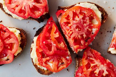 Tomato Cheddar Toasts Recipe - NYT Cooking Whipped Goat Cheese, Cheddar Chicken, Peach Salad, Herb Salad, Summer Tomato, Nyt Cooking, Cooking Guide, Summer Vegetable, Most Popular Recipes