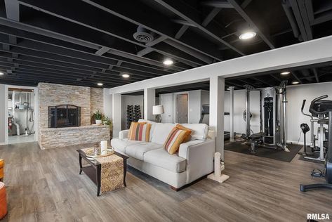 Basement Unfinished Ceiling, Exposed Ceiling Basement, Black Ceiling Basement, Exposed Basement Ceiling Ideas, Finished Basement Gym, Gym Ceiling, Basement Master, Basement Stairwell Ideas, Basement Ceiling Insulation