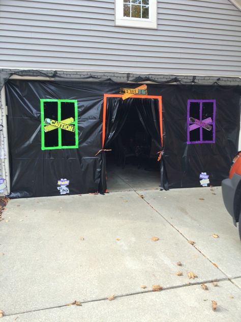 Garage Party Halloween Garage Decorations Party, Decorate Garage For Halloween Party, Garage Into Party Space, Halloween Party In Garage Ideas, Classroom Trick Or Treat Ideas, Halloween Candy Table Trick Or Treat, Halloween Garage Party Decorations, Halloween Party Garage, Garage Halloween Decor