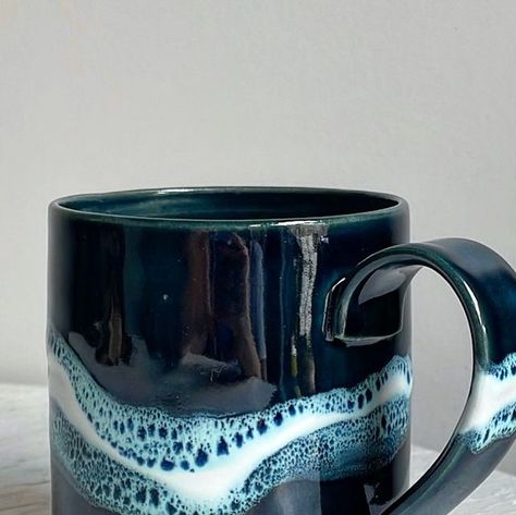 Peridot Pottery on Instagram: "I always get so many questions about this glaze combination. It’s one I use often and feels almost fool proof at this point. Snow by AMACO creates this really gorgeous oil spot reaction over Storm, which is a dark moody blue. On grey clay like this, it’s nearly black." Gray Glaze Combinations, Amaco Celadon Glaze Combinations Storm, Snow Over Obsidian Glaze, Amaco And Mayco Glaze Combinations, Amaco High Fire Glaze Combinations, Amaco Flambe Glaze Combinations, Celadon Snow Glaze Combinations, Amaco Blue Lagoon Glaze Combinations, Glaze Layering Combinations