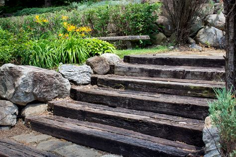 How To Use Railway Sleepers In Your Garden | Bury Hill Topsoil and Logs Blog | Gardening Advice Blog Sleeper Steps, Railway Sleepers Garden, Sleepers In Garden, Landscape Stairs, Landscape Steps, Townhouse Garden, Pathway Landscaping, Garden Railway, Railway Sleepers