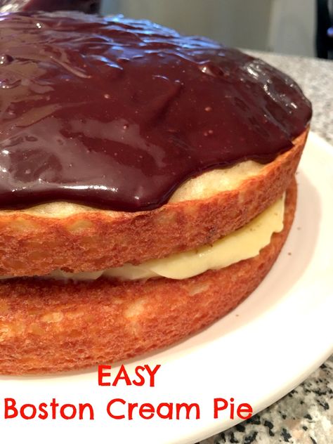 Boston Cream Pie is not actually a pie- It's a cake! 2 layers of fluffy white cake with creamy vanilla custard filling and glazed in chocolate ganache. Boston Cream Pie Cake Easy, Boston Cream Pie Pudding, Boston Cream Layer Cake, Boston Cream Pie Cake Mix Recipe, Easy Boston Cream Pie Simple Cake Mixes, Boston Cream Pie Easy, Boston Cream Pie Mini Bundt Cakes, Boston Cream Pie Cake Recipe, Boston Cream Cake Easy