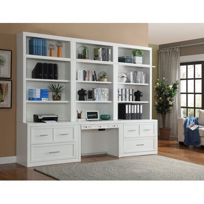 This 94.5'' bookcase and writing desk combo offers a classic touch to your home office or study space. The frame is made from a blend of solid and engineered wood, featuring adjustable shelves that are just right for housing your favorite reads or decorative items. Its many shelves provide ample support for your belongings. At the center, an integrated writing desk gives you a dedicated spot to work or study. Best of all, this 120'' wide piece comes with a wall anchor for security. | Lark Manor™ Library Desk, Office Bookshelves, Office Built Ins, Home Office Library, Office Furniture Sets, Library Wall, Bookcase Wall, Reading Nooks, Study Design