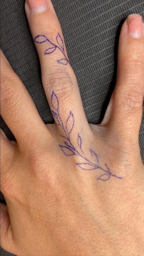 bodyartbyannie on Instagram Branch Finger Tattoo, Tiny Thumb Tattoos, Finger Tattoos Floral, Small Flower Finger Tattoo, Finger Vine Tattoos For Women, Floral Finger Tattoos For Women, Olive Branch Hand Tattoo, Vine Hand Tattoos For Women, Wrap Around Finger Tattoo