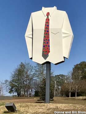 Andalusia, Al - Metal sign replica of a giant white shirt with a red necktie perched atop a pole as if being worn by an invisible man. Big White Shirt, Andalusia Alabama, White Dress Shirt, Invisible Man, North And South America, Roadside Attractions, Andalusia, White Shirt Dress, Vintage Signs