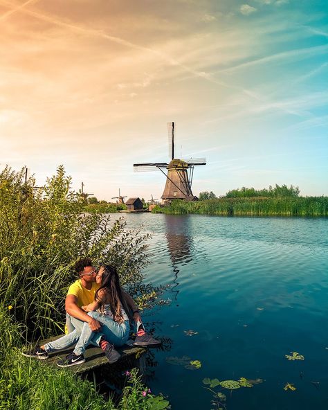 Looking for beautiful places for couple photoshoots? Get instagram photo inspiration or instagram picture ideas from adventure travel couple Chloe and Michael from @nomadandinlove. Photo taken in Kinderdijk Windmills, one of the top places to visit in the Netherlands. This Netherlands travel guide explains how to get to Kinderdijk windmills, things to do in Kinderdijk Windmills In Holland, Photography Aesthetic Ideas, Kinderdijk Windmills, Day Trips From Amsterdam, Holland Windmills, Instagram Picture Ideas, Winter Travel Destinations, Europe Photography, Europe Trip Itinerary