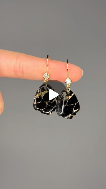 The Clay Lady on Instagram: "Rocking the elegance with these black marbled earrings. ✨🖤 Show these beauties some love - let’s spread the chic vibes. . . . #polymerclay #polymerbusiness #polymerclayearrings #smallbusinesstok #smallbiz #etsyshop #earrings #jewelrymaking #handmade #cute #creative #artist #clayearrings #clayearringshop #shopnow #clayfuldesingstudios #craft #etsyshop #smallbusiness #polymerclaytechnique #polymerclayartist #fyp #explorepage #polymerclaymarble #blackmarblepolymerclay" Clay Earrings Diy Ideas, Polymer Clay Earring Ideas, Black Clay Earrings, Black Polymer Clay Earrings, Marbled Earrings, Fimo Earrings, Clay Techniques, Chic Vibes, Black Clay