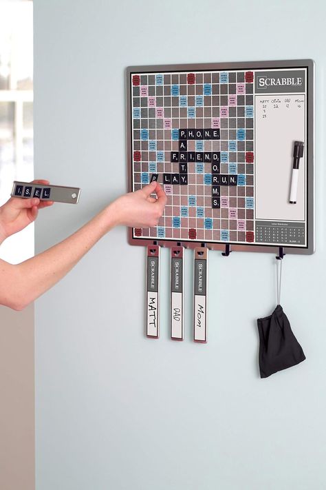 This vertical, wall mount version of the classic Scrabble game has a full-sized metal game board on one side and a dry erase message board on the other. Scrabble Game, Game Board, Message Board, Dry Erase, Board Games, Wall Mount, Toys, Wall