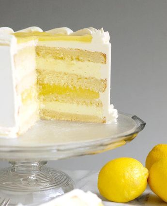 Luscious Lemon Mousse Cake might be the perfect layer cake. Lemon cake with Limoncello syrup, zesty lemon curd and creamy lemon mousse. (Limoncello liquor is optional.) Lemon Mousse Cake, Easy Lemon Cake Recipe, Easy Lemon Cake, Vegan Lemon Cake, Lemon Cake Easy, Moist Lemon Cake, Curd Filling, Lemon Layer Cakes, Bavarian Cream