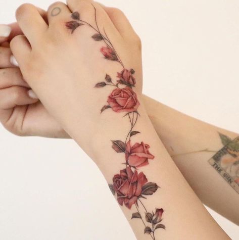 Rose Vine Hand Tattoo, Wrapping Flower Tattoo, Climbing Rose Tattoo, Rose Wrist Tattoo For Women, Rose Wrap Around Tattoo, Flower Tattoos On Hand, Floral Hand Tattoos, Grace Tattoo Ideas, Unique Female Tattoos