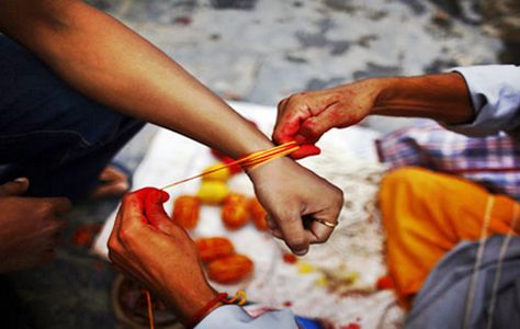 Nepal celebrates hundreds of religiously and socially important festivals throughout the year. Among them, Janai Purnima (Janai means sacred thread and Purnima means full moon) is the sacred thread festival practice by Hindu peoples.http://www.trekkingmart.com/news/15-nepal-celebrating-janai-purnima-festival Janai Purnima, Nepali Food, Buddhist Mantra, Sacred Threads, Today Horoscope, Basil Plant, Global Village, Wildlife Safari, Experiential