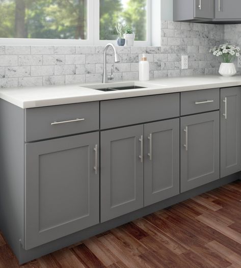 RELIABILT ready to assemble shaker style cabinets are a simple yet stylish addition to any space. The Overlake collection has a smooth painted exterior in matte gray and features all plywood, full overlay, framed construction. Its clear coat is scratch and moisture resistant, reducing damage and extending the life of your RTA kitchen cabinetry. RELIABILT Overlake 24-in W x 30-in H x 24-in D Gray Diagonal Corner Wall Ready To Assemble Plywood Cabinet (Recessed Panel Shaker Door Style) Ikea Gray Kitchen Cabinets, Soft Grey Kitchen Cabinets, Backsplash Kitchen Ideas For Grey Cabinets, Gray And White Kitchen Ideas Inspiration, Kitchen Backsplash Grey Cabinets, Gray Lower Cabinets White Upper, No Top Cabinets Kitchen, Light Grey Kitchen Cabinets Modern, Short Kitchen Cabinets