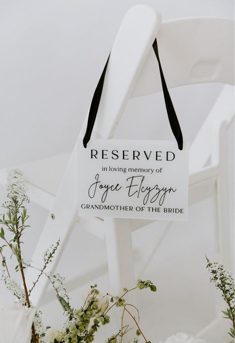 Introducing our acrylic reserved in loving memory sign, a heartfelt addition to your wedding ceremony. Crafted with meticulous attention to detail, this beautiful acrylic sign provides a touching way to honour and remember loved ones who are no long with you on your wedding day. Choose to have your in loving memory sign hanging from a chair, or placed on the chair or table using our acrylic or wooden base options. Our high-quality acrylic boasts durability while maintaining an elegant appearance How To Honour Loved Ones At Wedding, Reserved Seating Wedding Ceremony, In Memory Wedding Table, Wedding Remembering Loved Ones, Memory Chair At Wedding, Memory Sign For Wedding, Reserved Seating Wedding, Memory Table Wedding, Sign For Wedding