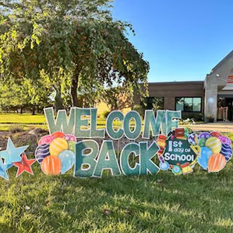 PRICES MAY VARY. Greet your students back to school with our welcome back to school waterproof yard card set. FILLERS: This set is perfect for adding between layers of yard letter text to hide stakes. STURDY METAL STAKES: This set includes 24 sturdy metal stakes. Use 2 stakes per sign cutout. SCHOOL DECOR: The quality color graphics make a happy first day of school celebration MADE IN USA – Order these and other festive products made by a family business in Davenport, IA Founded in 1999, Victory Halway Decor, First Day Of School Celebration, School Yard Signs, Happy First Day Of School, Backyard Buildings, Yard Cards, School Decor, School Celebration, Yard Decorations