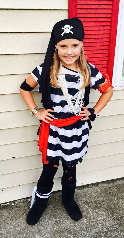 Easy girl's pirate costume made from cheap adult size "prisoner" costume and an old t-shirt. Diy Girls Pirate Costume, Diy Pirate Costume For Women, Pirate Man, Diy Pirate Costume For Kids, Diy Pirate Costume, Boys Pirate Costume, Homemade Pirate Costumes, Pirate Dress Up, Diy Costumes Kids Boys