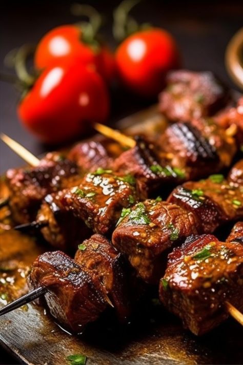 A popular tapas dish in Spain. This flavorful dish features tender cubes of beef marinated in a delicious blend of spices and grilled to perfection. The marinade infuses the meat with rich, aromatic flavors, creating a mouthwatering experience. Spanish Pinchos Recipes, Beef Skewer Appetizers, Middle Eastern Beef Kabobs, Beef On A Stick Skewers, Japanese Beef Skewers, Souvlaki Skewers, Lamb Souvlaki, Kebab Recipes Beef, Air Fryer Steak Bites