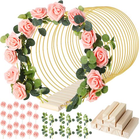 PRICES MAY VARY. Sufficient Quantity: you will receive 15 metal golden hoops, 15 natural wooden holders, 30 pink fake roses, 30 artificial leaves, 90 pieces in total, enough for DIY table centerpieces and wedding decorations, enough to replace and share Quality Material: metal rings are made of strong metal, each thickness is about 3 mm, diameter is about 10 inch, sturdy and reliable, not easy to rust, wooden frame adopts pine wood, with smooth surfaces and no burrs, artificial roses adopt PE fo Safari Table Centerpieces Flowers, Centerpieces For Party Amazon.com, Pink And Gold 1st Birthday Table Centerpieces, Quine Main Table, Dollar Tree Baby Shower Centerpiece, Dollar Store Centerpiece Stand, Rose Gold Birthday Party Table Centerpieces, Pink And Burlap Christmas Centerpieces For Table, Cricut Baby Shower Centerpiece