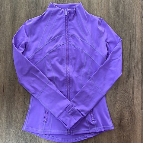 Whether You Are Working Out Or On The Go, Our Premium Lightweight Yoga Jacket Is A Great Addition To Have . This Stylish Compression Fit Contours The Body As You Stretch. It Is Soft, Comfortable, And Provides A Nice Refined Look. - Breathable - Sweat Wicking - Four Way Stretch - Quick Dry - Thumbholes - Zippered Pockets Materials: - 87% Nylon - 13% Spandex Care: - Wash With Like Colors - Machine Wash Cold - Tumble Dry Low - Do Not Bleach - Do Not Iron - Do Not Dry Clean Lululemon Outfit Fashion, Lulu Tops, Workout Jackets, Lulu Fits, Sporty Clothes, Lululemon Collection, Purple Lululemon, Lululemon Purple, Yoga Jacket