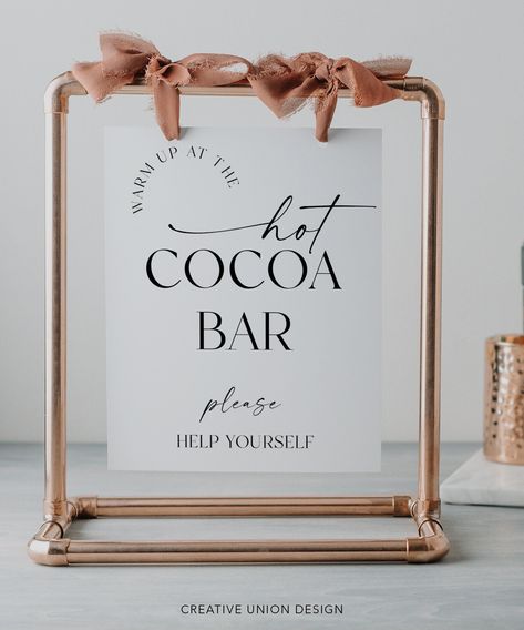 "Let everyone know where the hot chocolate bar is with this great editable sign template! 5x7 and 8x10 sizes included! PLEASE NOTE: This purchase is for a digital template. No physical item will be shipped. * * * * * MATCHING ITEMS * * * * * Build Your Own Bundle and save 60% when you purchase 5 or more items! Go to our shop home page and search: Simply Minimal Or click here: https://tidd.ly/43GgORp * * * * * TRY BEFORE YOU BUY * * * * * https://www.corjl.com/d/6GJOM6 * * * * * HOW IT WORKS * * * * * 1. After you purchase, you will receive an email with a link to log into the (FREE) platform Corjl.com 2. Edit your file on a computer, phone or tablet! 3. Save 4. Download the printable PDF or JPG (with or without bleed and crop marks) 5. Print  * * * * * FILE INFORMATION* * * * * Sizes Inclu Hot Cocoa Bar For Wedding, How To Make A Hot Cocoa Bar, Cocoa Christmas Bar, Wedding Cocoa Bar, Hot Chocolate Bar Sign Printable Free, Hot Chocolate Bar For Wedding, Party Hot Chocolate Bar, Hot Cocoa Bar Wedding, Hot Cocoa Bar Printables