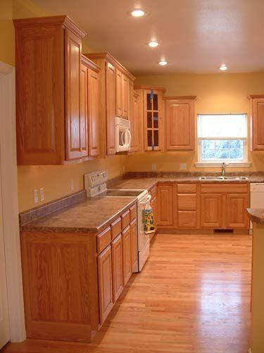 Kitchen w oak cabinets and floor 2 Cerused Oak Kitchen, Oak Kitchen Cabinets Wall Color, Orange Kitchen Walls, Kabinet Dapur, Oak Kitchen Cabinets, Orange Kitchen, Oak Kitchen, Modern Kitchen Cabinets, Dark Kitchen Cabinets