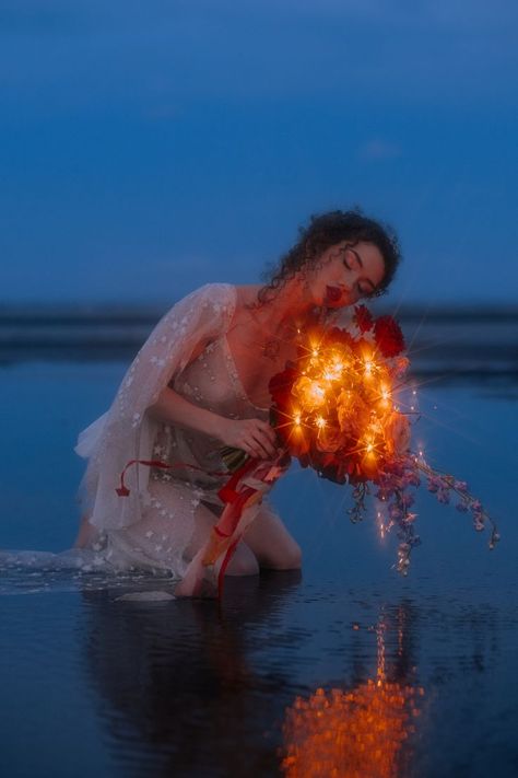 Catguts by Chloe Ireland Editorial Bridal Portrait Blue Hour Fire Bouquet Sparklers Water Portrait catgtusphoto Jennifer Gifford Intense Eye Contact, Translucent Dress, Water Portrait, Nature Shoot, Bride Styled Shoot, Water Nymphs, Blood Art, Beach Shoot, Shadow Art