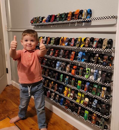 I Made A Wall Rack To Store/Display My Kid's Monster Trucks. For Less Than 20 Bucks, I Used Curtain Rods And Checkered Flag Duct Tape Monster Truck Bedroom, Monster Truck Room, Truck Bedroom, Duct Tape Diy, Truck Images, Truck Room, Monster Truck Toys, Cars Room, Car Bedroom