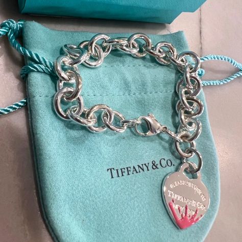 Brand New And Never Used. Size 7.5 Inches. The Bracelet Is Crafted Of Sterling Silver And Features A Heart Tag Charm. Guaranteed To Be Authentic And Comes With Original Pouch And Box. Will Be Tied With The Signature Tiffany Bow. This Would Make An Amazing Gift! Tifanny And Co Bracelet, Tiffany And Co Pink, Tiffany Bracelet, Pink Splash, Tiffany And Co Bracelet, Tiffany And Co Jewelry, Tiffany Bracelets, Return To Tiffany, Vintage Tiffany