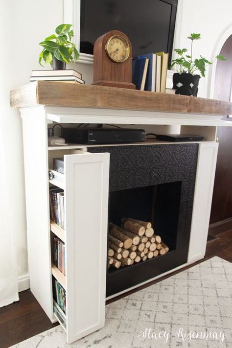 Fireplace with hidden storage! #hiddenstorage #spacesaver #spacesavingfurniture #multifunctional #multifuntionalfurniture #diy Fireplace With Hidden Storage, Faux Fireplace Diy, Cute Little Houses, Faux Fireplace, Diy Fireplace, Home Fireplace, Fireplace Makeover, Space Saving Furniture, Hidden Storage