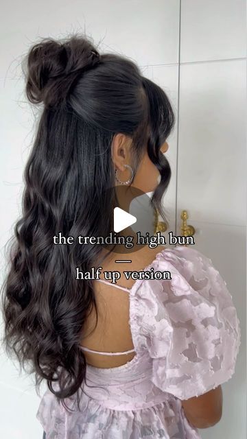 KIRA MCCLENAGHAN on Instagram: "Putting my lil spin on the viral high bun with this half up version 🩷  Products Used @designmehair PUFF.ME volumizing powder + dry texture spray and HOLD.ME three-way hairspray   Enjoy, my KWEENS!   #DMcollab #hairreels #bridalhairstyle #bridalhaireducation #hairvideos" Half Bun With Curls, High Bun Half Up Half Down, Half Up High Bun, Curly Bun Half Up Half Down, Long Hair Half Up Half Down Bun, Wedding Shower Hair, Half Up Half Down How To, Half Up Half Down Wedding Hair Bun, How To Do A Half Up Half Down Bun