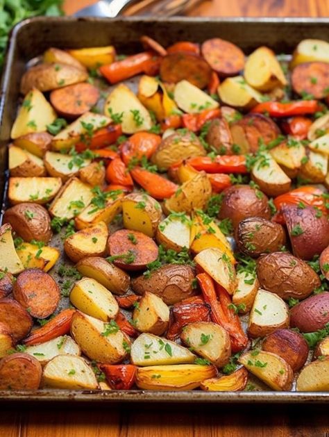 A delicious and hassle-free meal featuring sliced smoked sausage, baby potatoes, onions, and bell peppers, seasoned with a blend of spices and baked to perfection. Ideal for busy weeknights, this colorful sheet pan supper is packed with flavor and simple to prepare. Sausage Potatoes And Peppers, Potato Sheet Pan, Smoked Sausage And Potato Recipe, Sheet Pan Supper, Sausage Potato, Kielbasa Sausage, Potatoes Onions, Sheet Pan Suppers, Sausage Potatoes