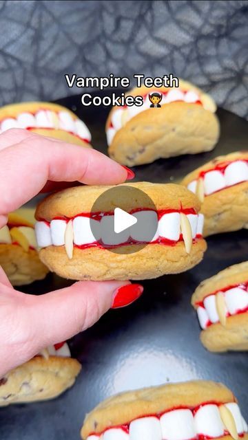 Genevieve LaMonaca on Instagram: "Vampire Teeth Cookies🧛 Follow @chefgenevieve for 50 Halloween inspired recipes. These cookies are perfect for a Halloween party or to send with your kids to school.

Spooky Vampire Teeth Cookies
Recipe make 24 cookies

Ingredients:

1 cup salted butter, room temperature
1 cup white granulated sugar
1 cup brown sugar, packed
2 eggs
1 tsp vanilla extract
3 cups all purpose flour
1 tsp baking soda
1/2 tsp baking powder
1 tsp salt
10oz mini chocolate chips
1 10oz bag mini marshmallows
1 tube red gel glaze (can substitute with seedless raspberry jam)
1 small bag Slivered Almonds

Directions:

Preheat oven to 375 degrees F. Line a baking sheet with parchment paper and set aside.

Cream together butter and sugars until combined.
Beat in eggs and vanilla until fl Vampire Treats, Teeth Cookies, Vampire Cookies, Seedless Raspberry Jam, Vampire Cookie, Freshman 15, Cookie Dough Brownies, Marshmallow Cookies, Vampire Teeth